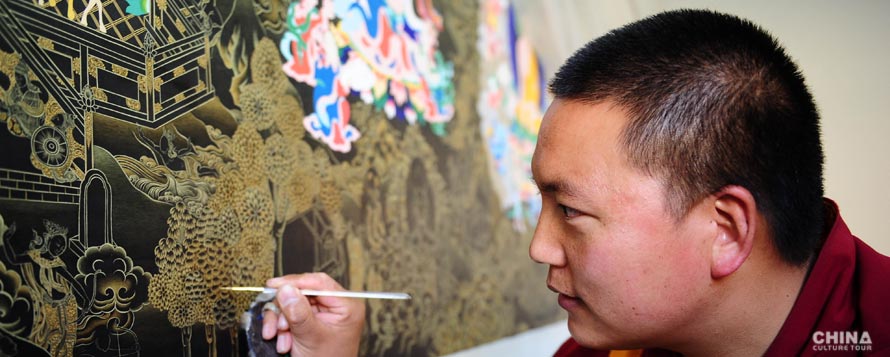 A monk painting thangka