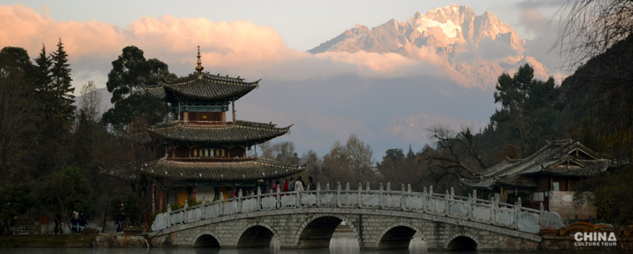 Lijiang Old Town with Jade Dragon Snow Mountain in the backdrop